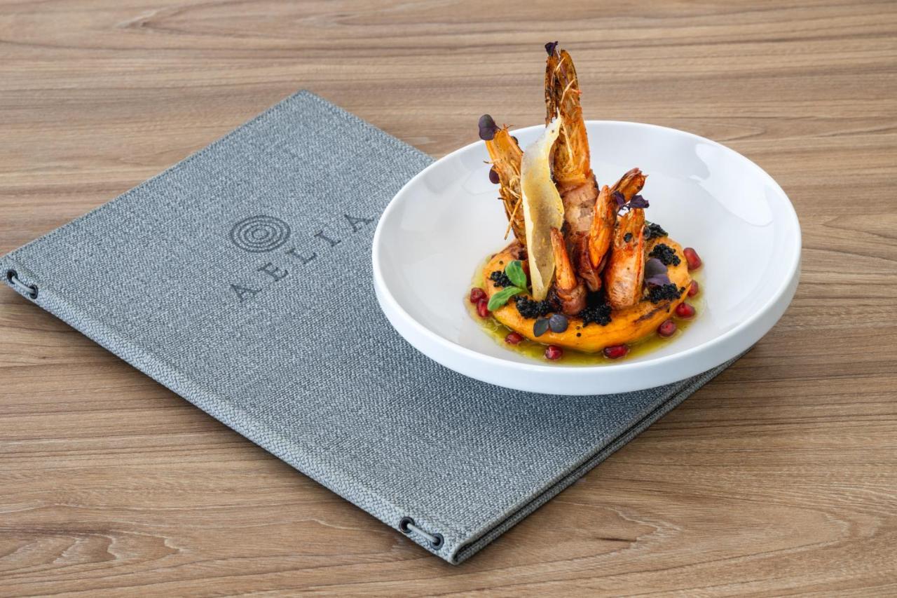 Aelia Luxury Suites Karterados  Esterno foto A dish from ELIX